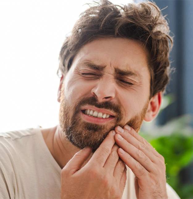 A man with wisdom dental pain and getting wisdom teeth removal in camarillo