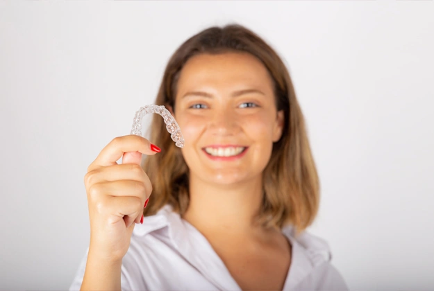 Orthodontic Solutions for a Confident and perfect Smile like this girl